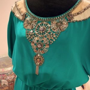Trina Turk beaded neckline green cocktail dress. Fully elastic waist. Size 6/M
